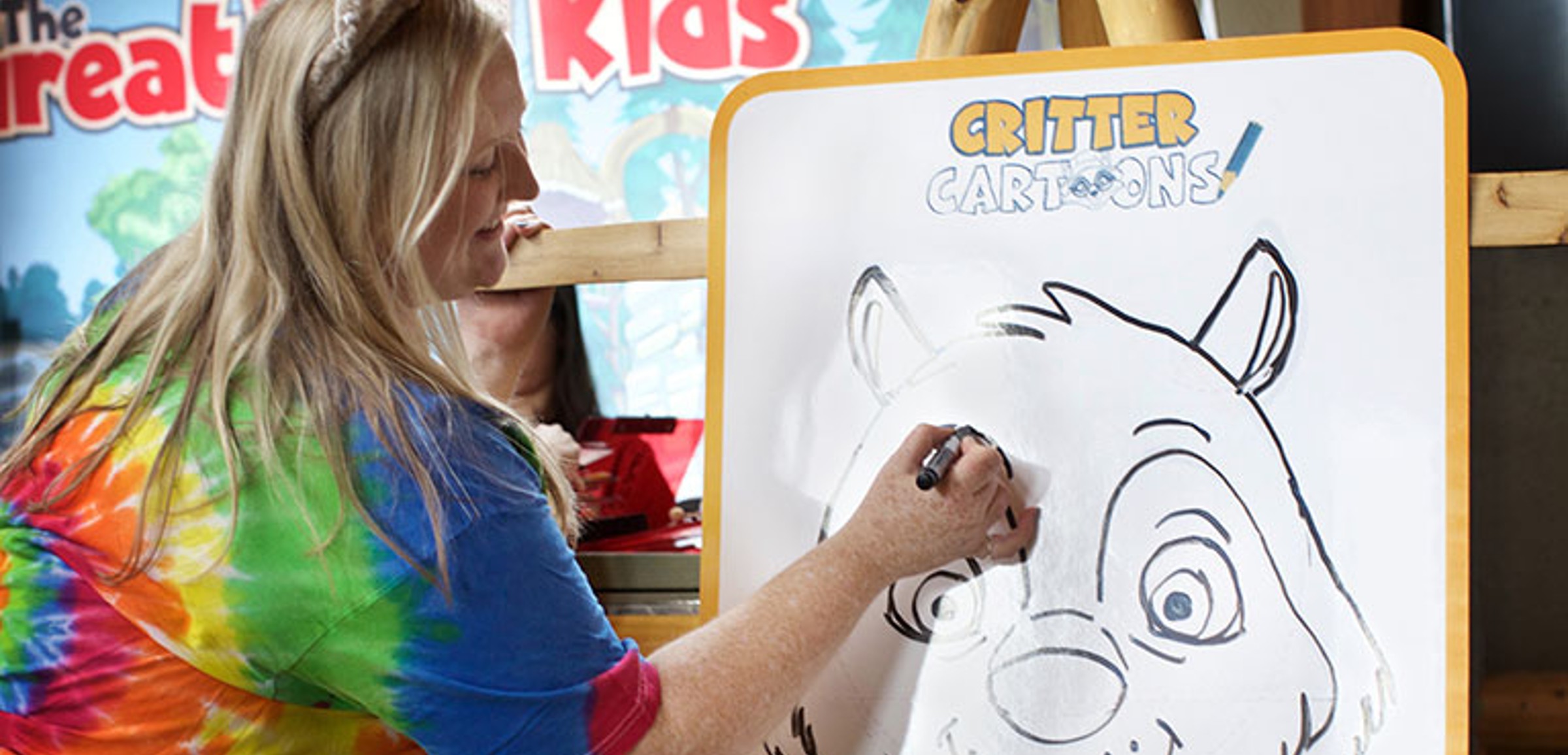 Pack member leading a drawing class